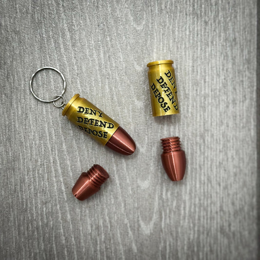 Deny Defend Depose Pill holder keychain